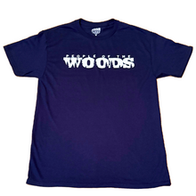 Load image into Gallery viewer, A navy blue t-shirt with &#39;PEOPLE OF THE WOODS&#39; text and a pine tree silhouette design in white.
